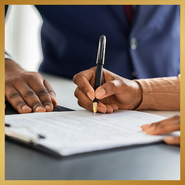 person signing papers