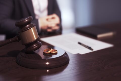 Gavel with Wedding Rings and Legal Papers on Desk in Tucson, AZ & Pima County