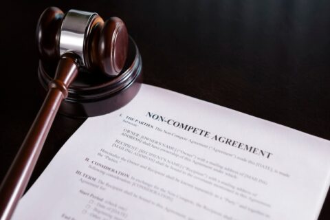 Non-Compete Agreement Document with a Wooden Gavel on a Desk in Tucson, AZ & Pima County