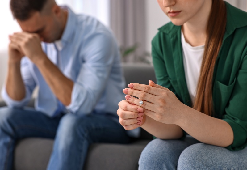 Woman Taking Off Ring After Uncontested Divorce with Her Husband in Tucson & Pima County, AZ