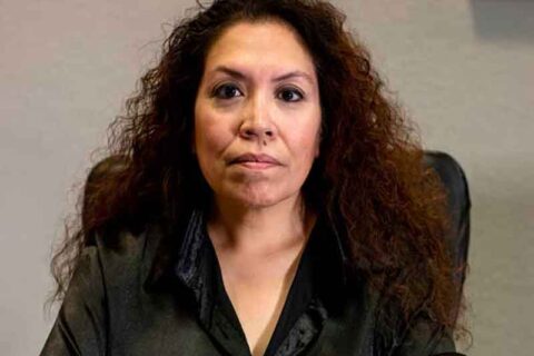 Anita Hazlette, a divorce lawyer offering family law services in an office setting in Tucson, TX